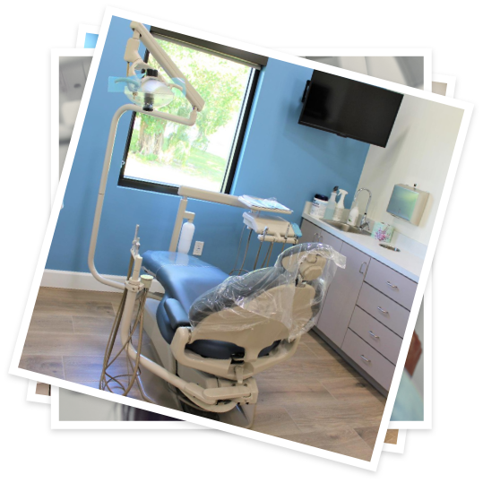 Dental treatment chair in room with light blue walls