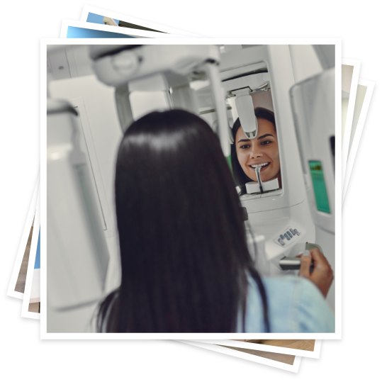 Woman getting digital dental scan of her mouth taken