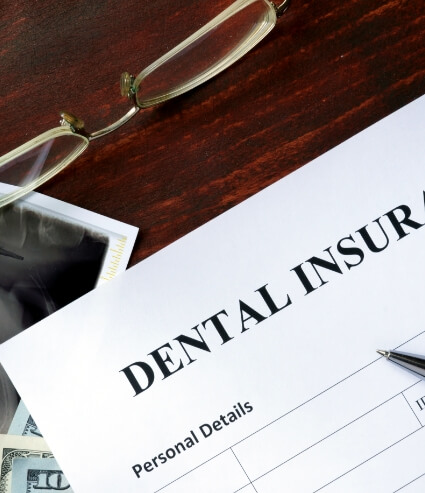 Close up of dental insurance paperwork