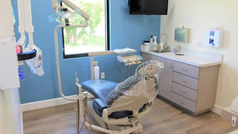 Dental exam room with blue walls