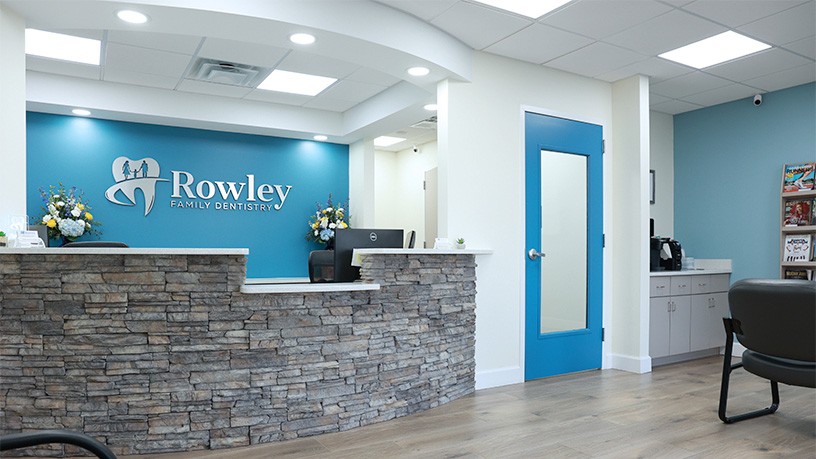 Front desk and part of reception area of Rowley Family Dentistry