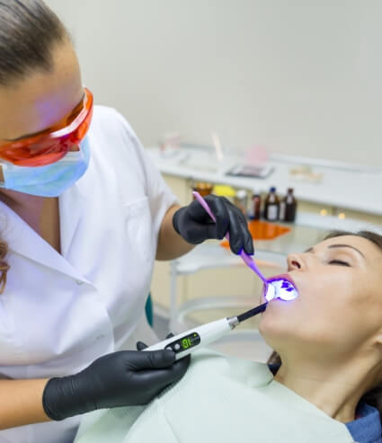 Sedation dentist in Melbourne treating a dental patient