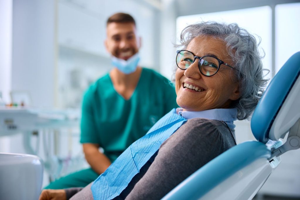 An older woman in a dental chair